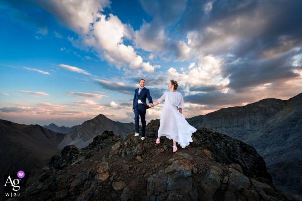 Bride and groom at the top of the mountain