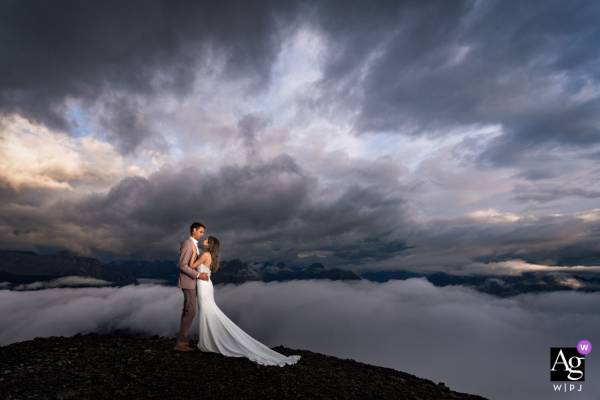Bride and groom at the top of the mountain