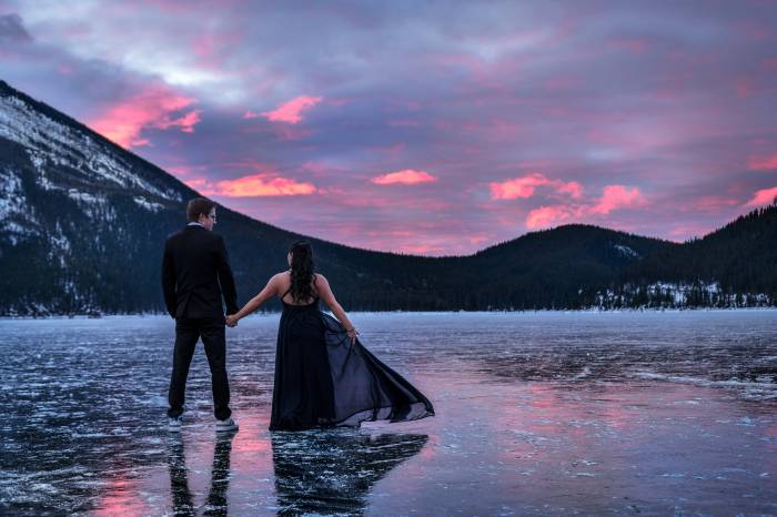 stunning sunrise during engagement photo session at Moraine Lake