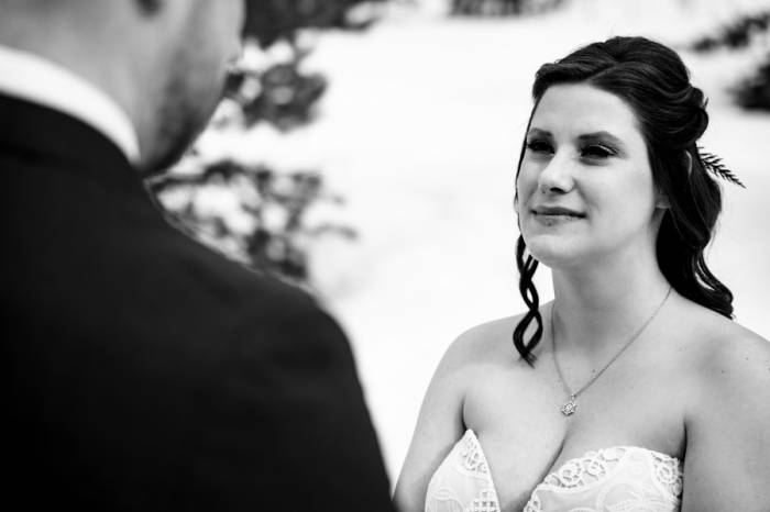 Bride looks at her future husband during Calgary Wedding Ceremony.