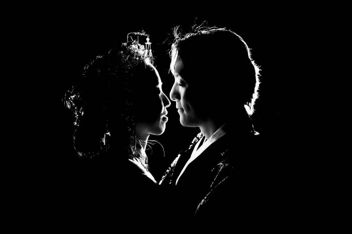 back-lighted newlyweds in black and white. Creative Photograph taken by Banff Wedding Photographer Eliza Slobodzian