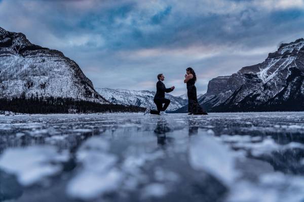 Proposal on one knee during gorgeous sunrise in Banff.