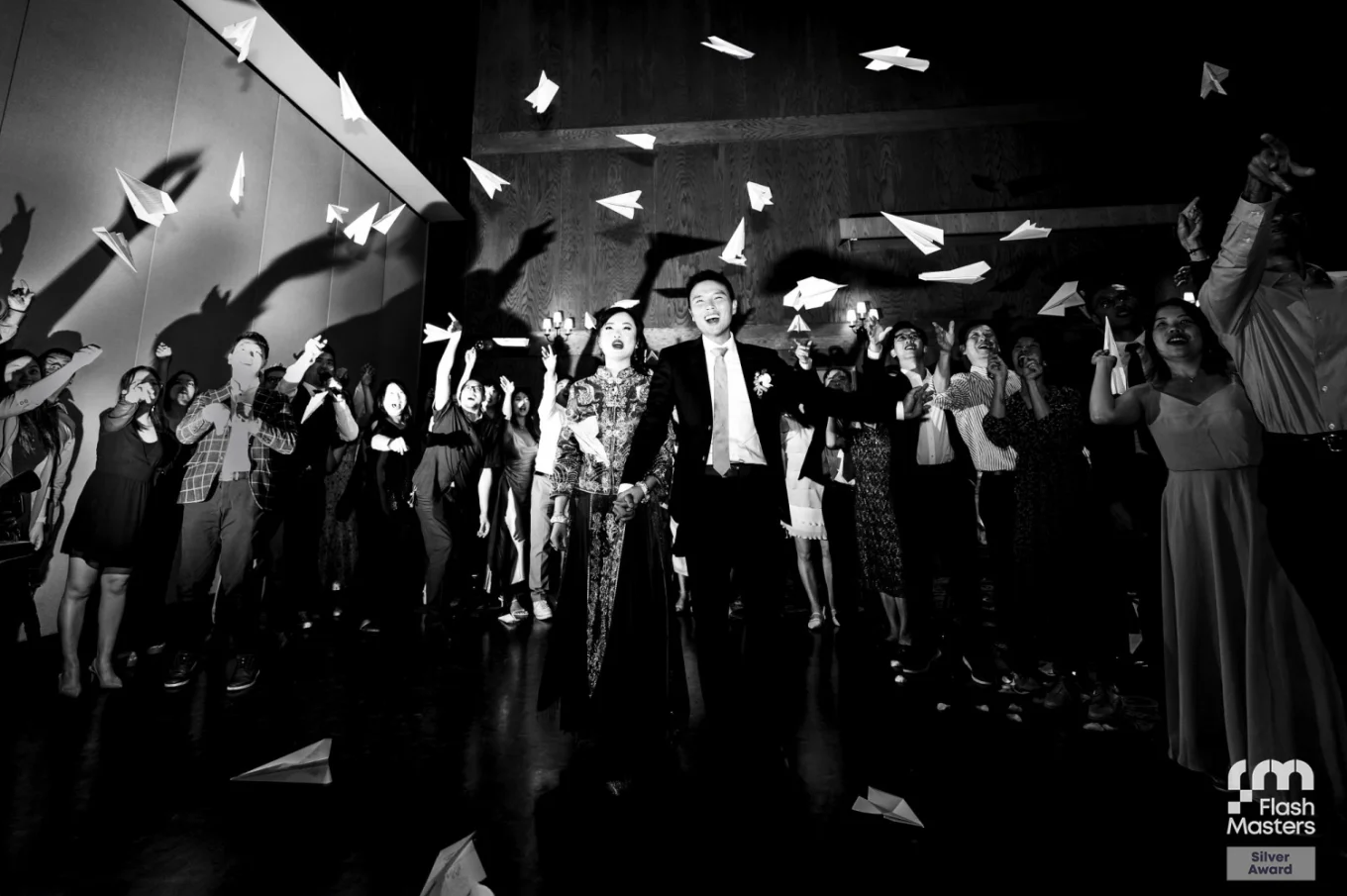 Bride and groom walking off the reception