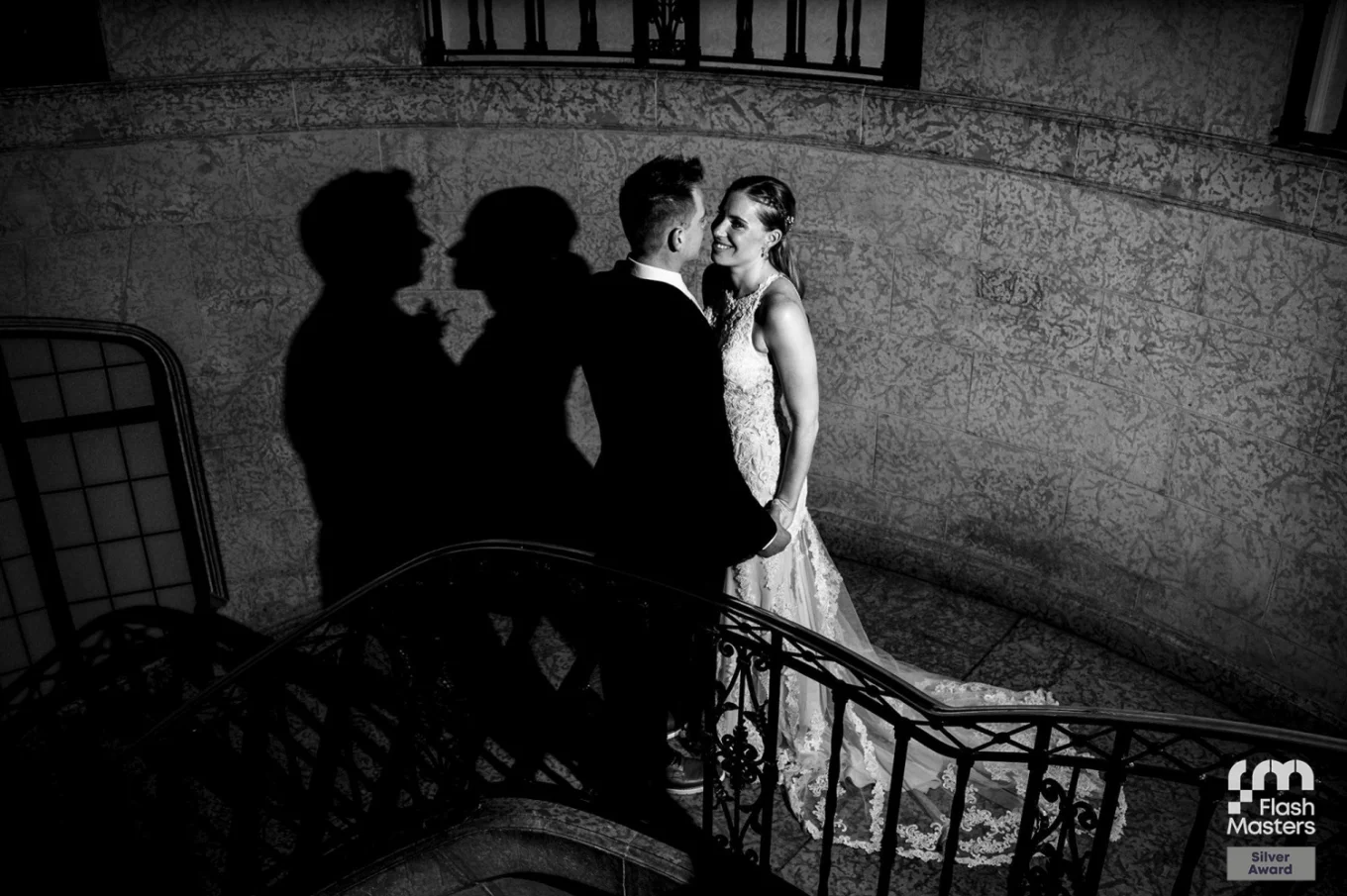 Newlyweds on the stairs in Fairmont hotel in Banff