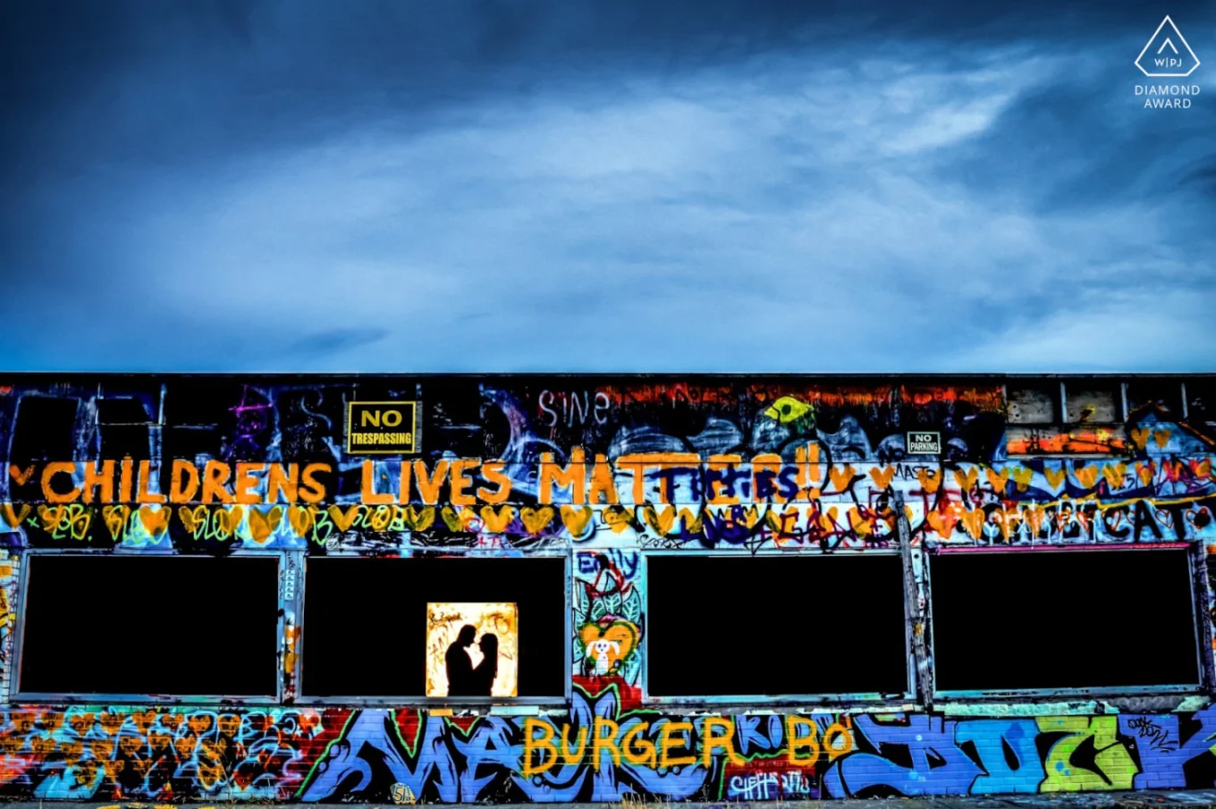 backlighted couple in love in an abounded building in Calgary