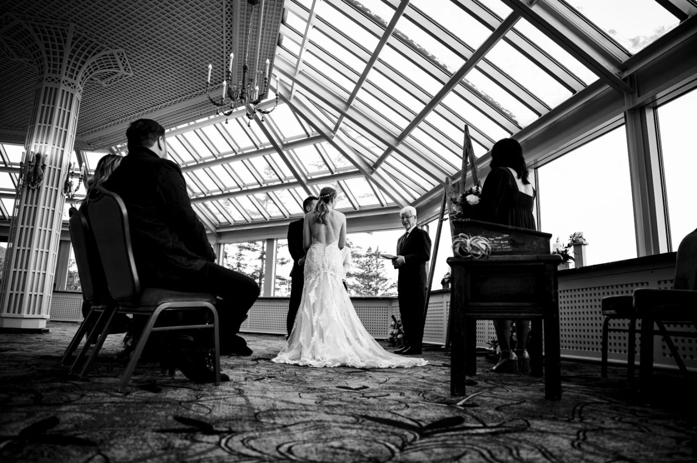 Banff Wedding Photography at the Wedding Ceremony in conservatory room at Fairmont Hotel in Banff.