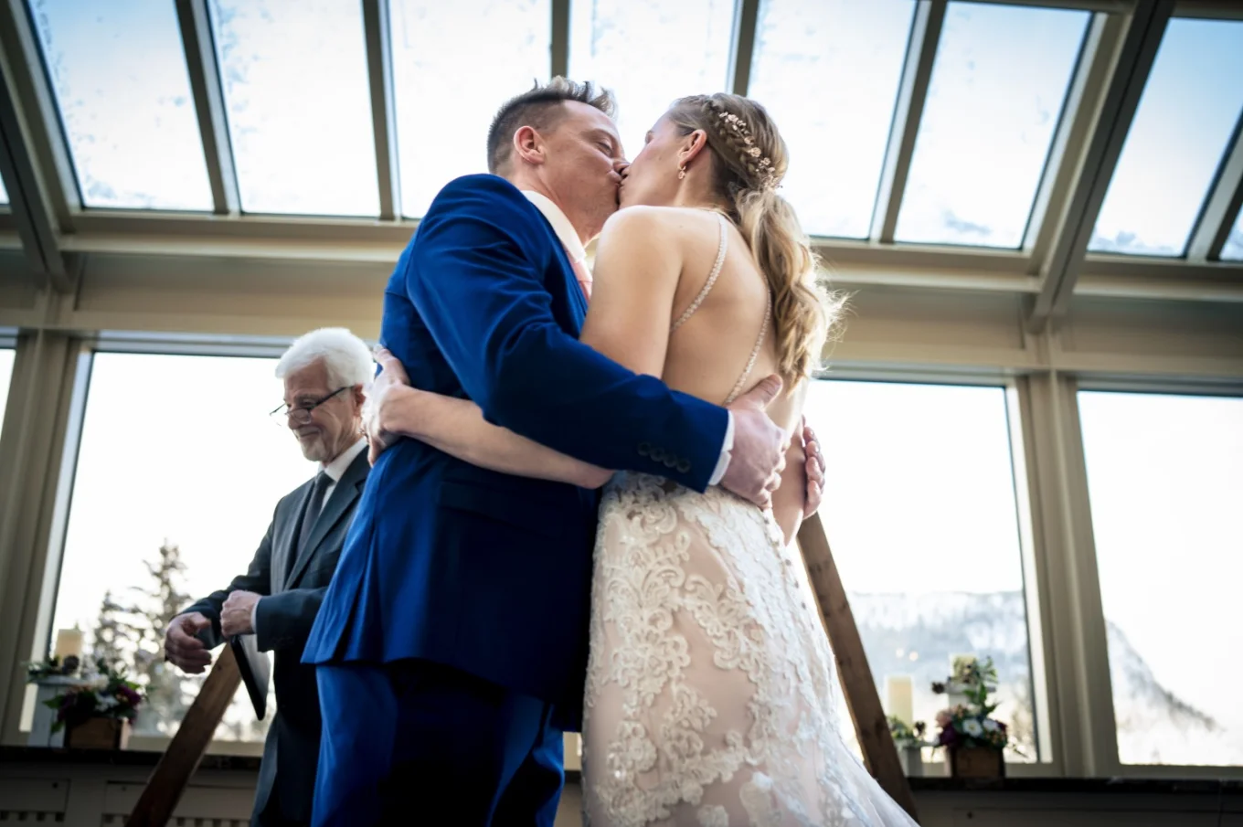 First kiss of the bride and groom.