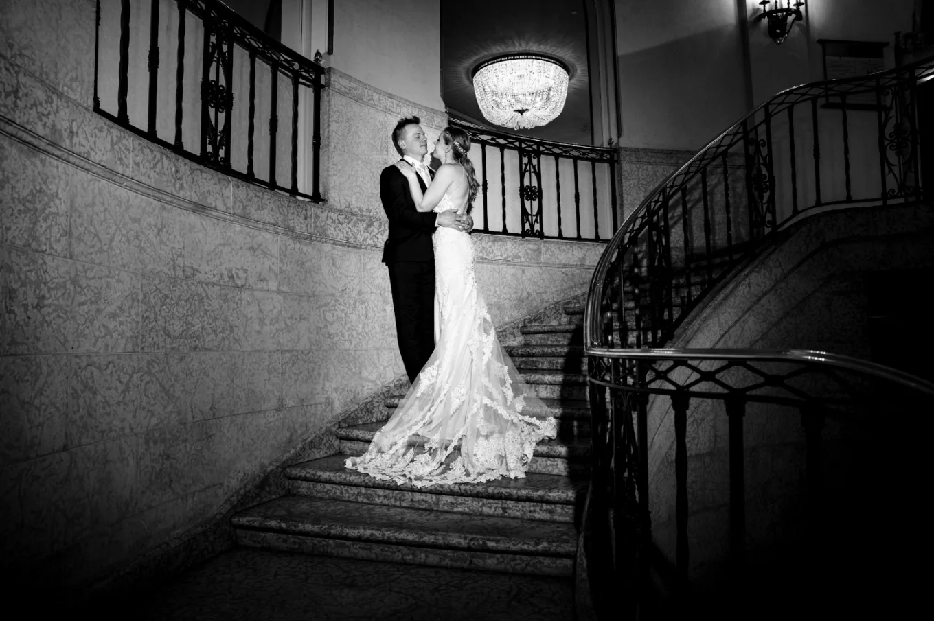 Unique Banff Wedding Portrait of the newlyweds standing on the stairs.