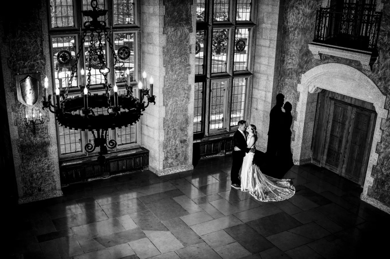 Amazing Banff wedding portrait captured from the balcony at Fairmont Banff Springs by Calgary Wedding Photographer.