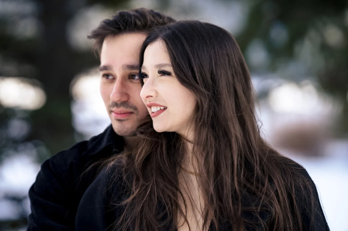 Portrait of the couple looking at the same direction.