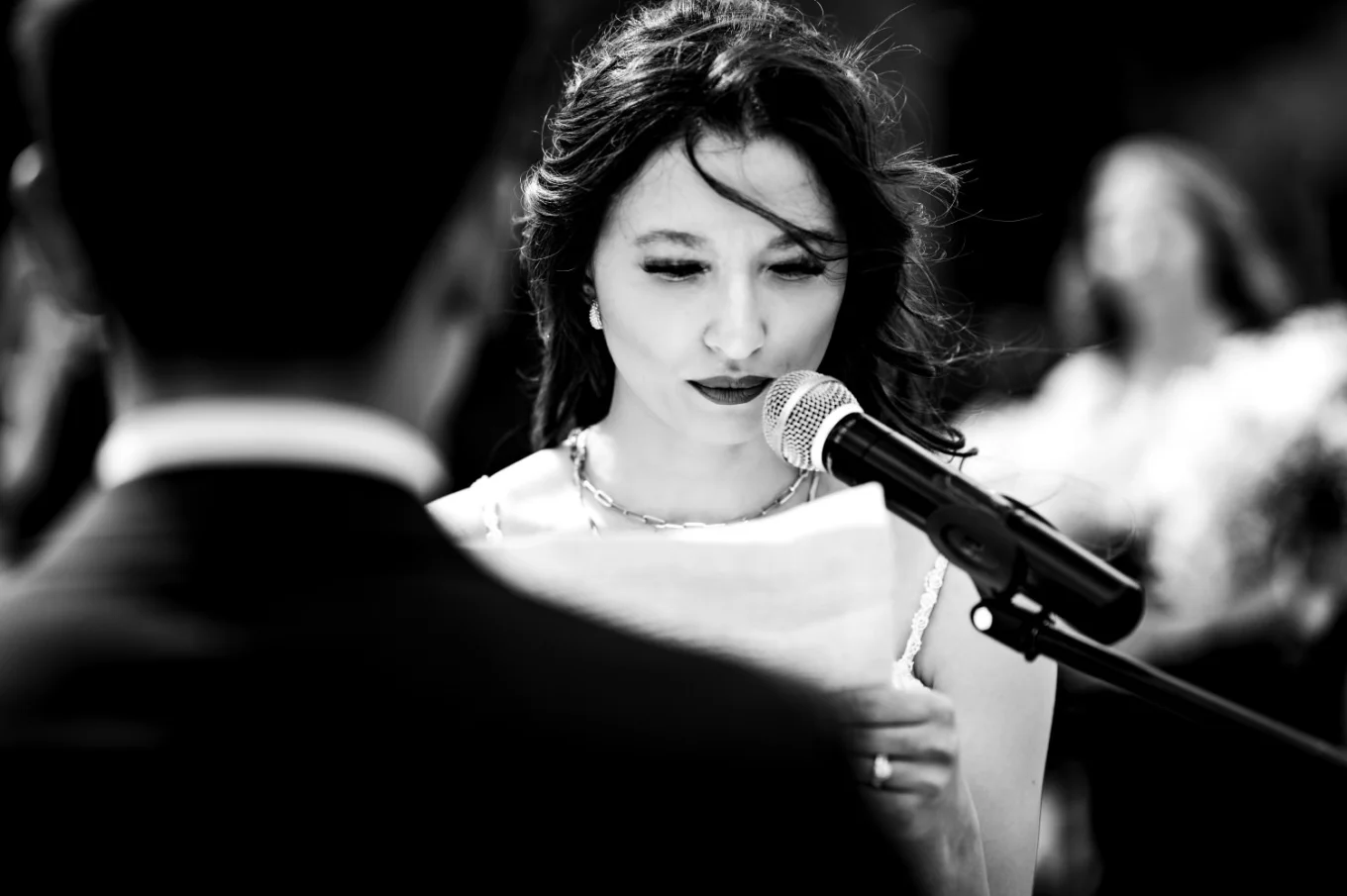 The bride speech to the microphone on the wedding ceremony in Calgary