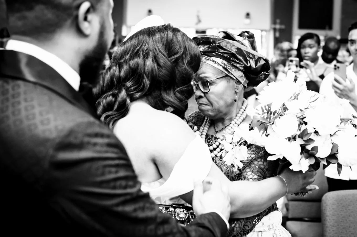 Mother and daughter in a hug before a wedding ceremony in Calgary.