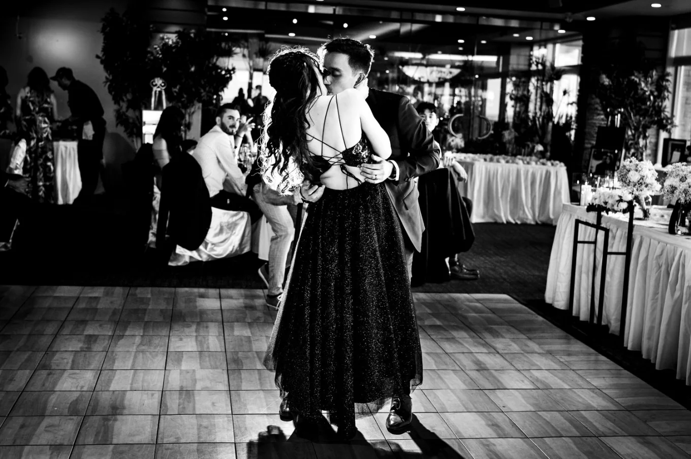 Bride and groom share a kiss after the first dane