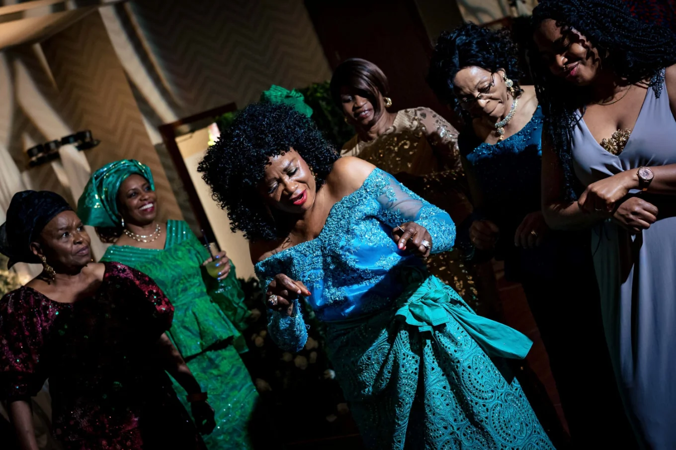 Nigerian ladies in a traditional Nigerian dresses dance at the Calgary Wedding in Sheraton.