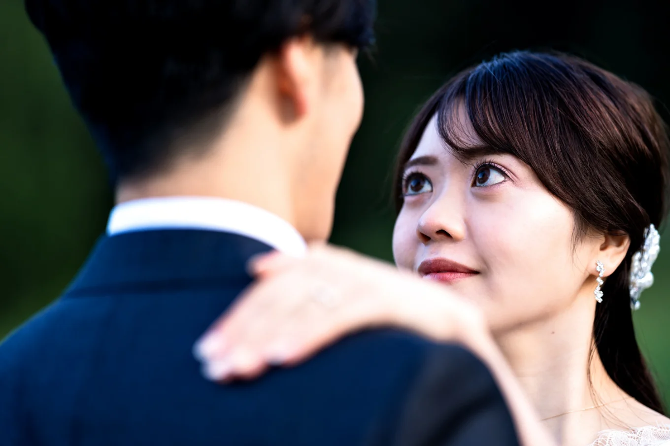 Bride look into her husband with love and passion.