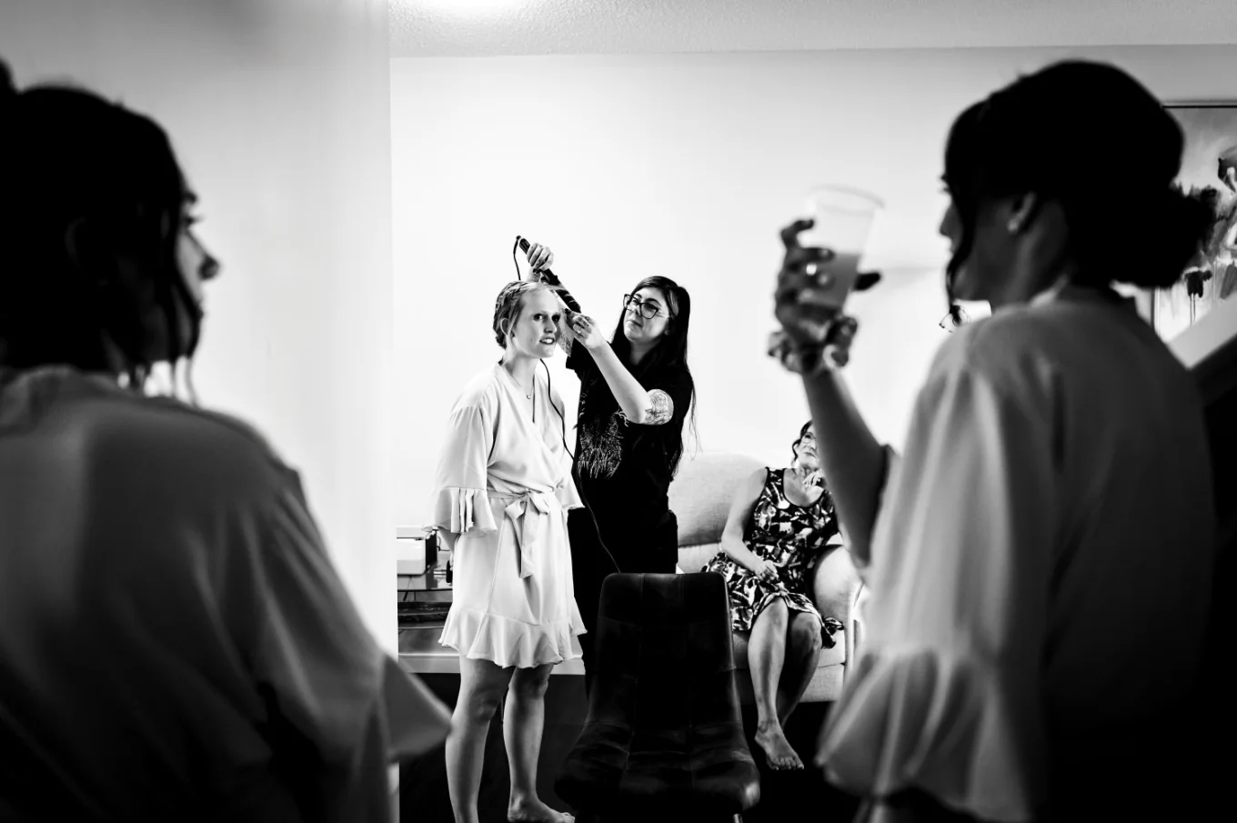 Girls are getting ready before the wedding ceremony.