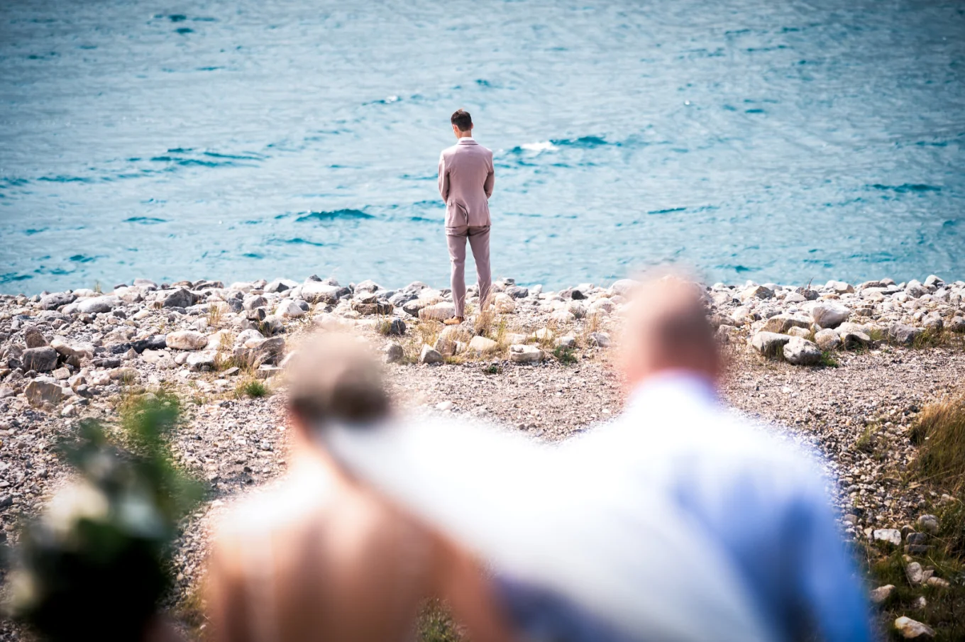 Father of the bride walks her down the aisle while the groom waiting at the lake in Banff.