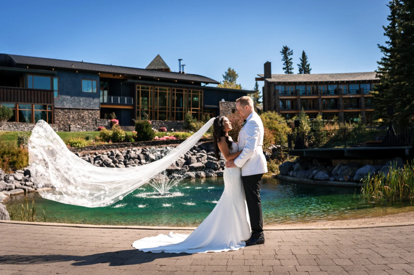 Calgary Wedding Portraits of the bride and groom in a hug