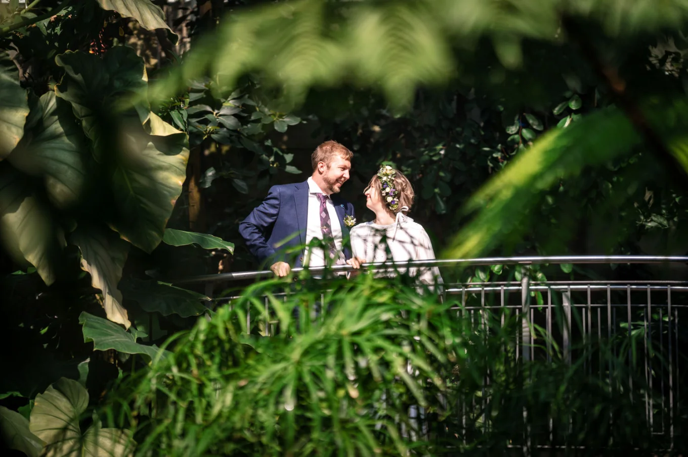 Shoot through the exotic plants of the bride and groom at the Calgary Zoo Wedding
