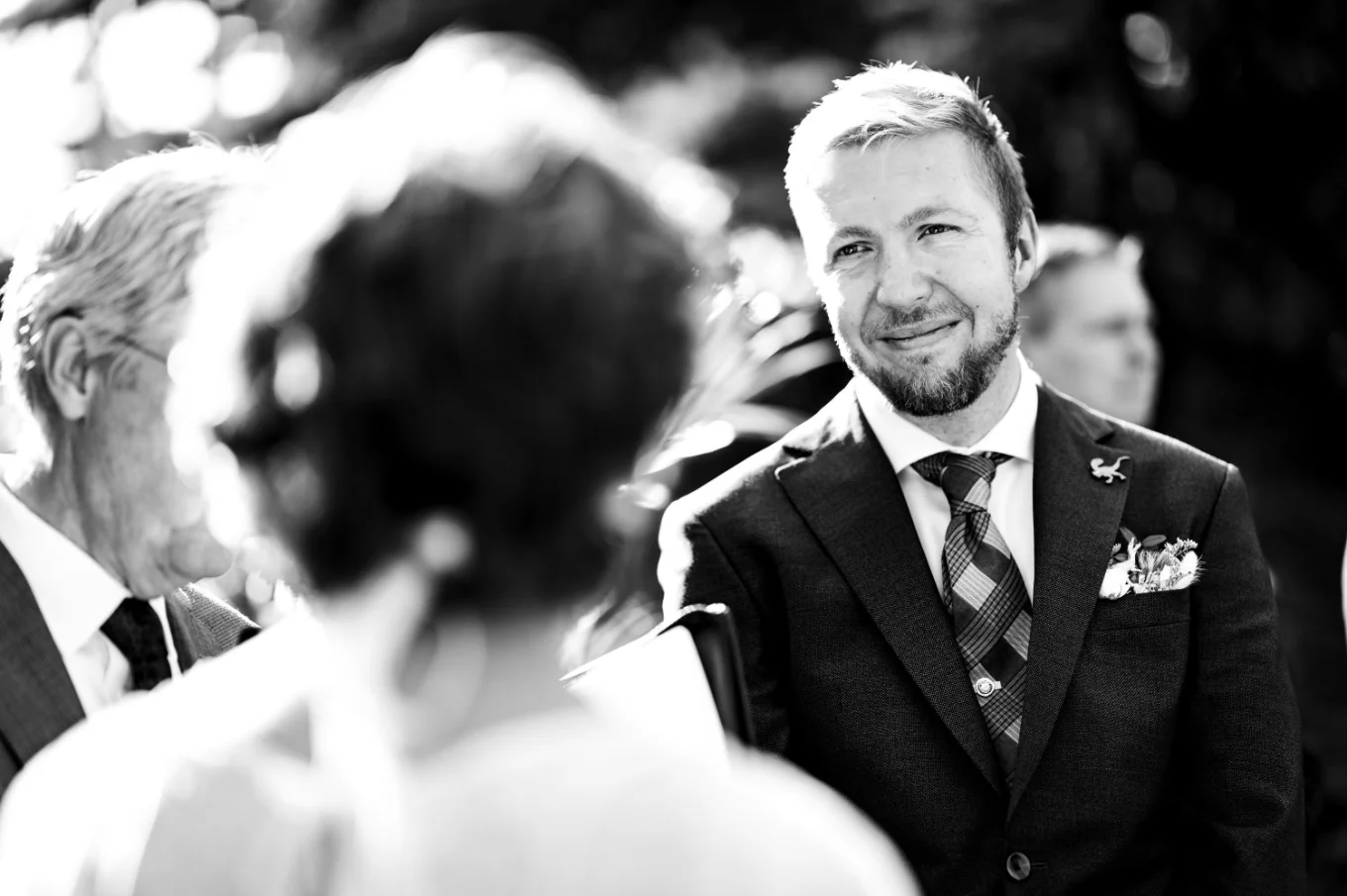 The groom look at the bride with love