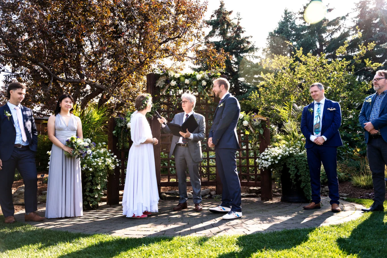 Bride and groom getting married at the Calgary Zoo