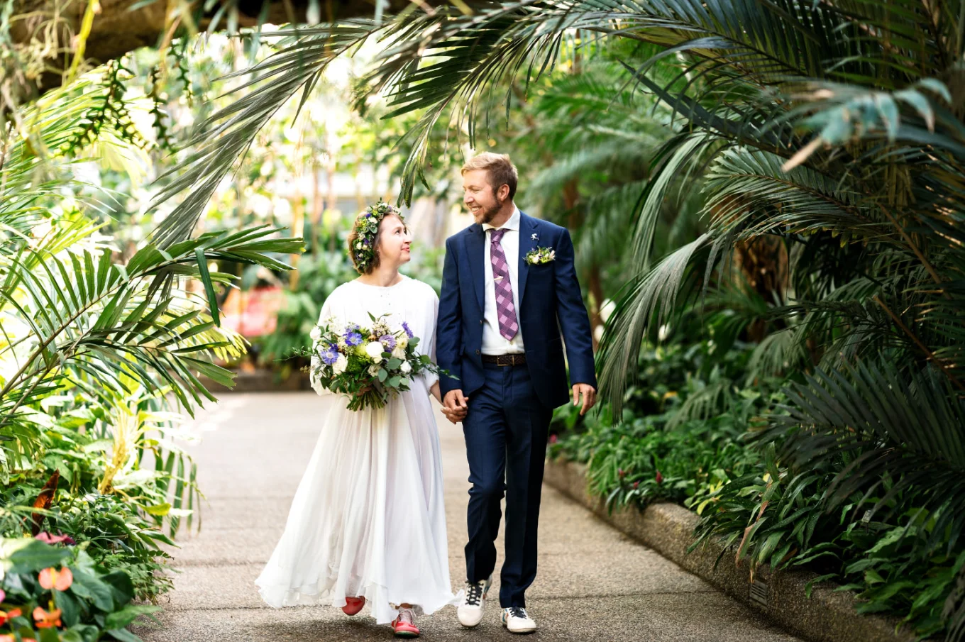 Calgary Wedding Photography of the bride and groom waking at the Calgary Zoo