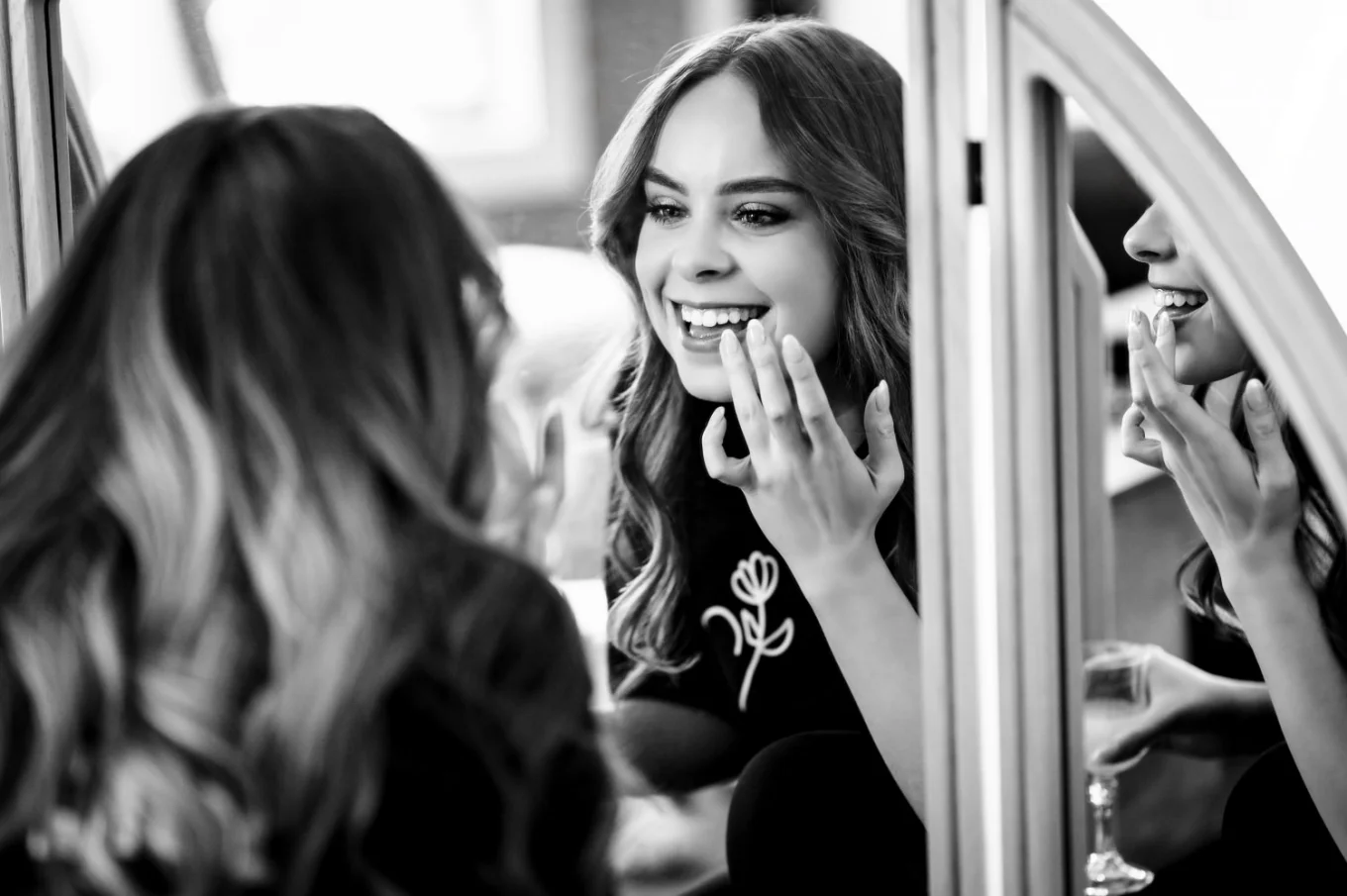 canadian wedding photography of bride putting on lipstick