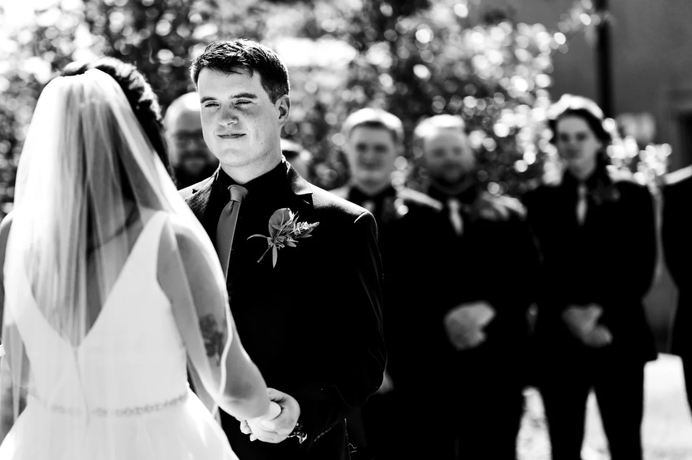 Groom and bride hold their hands at the Canadian Wedding Ceremony