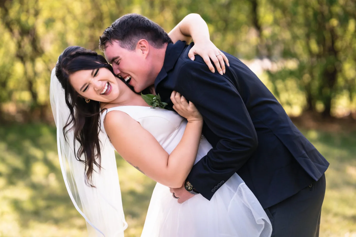 Groom tries to bit the bride's neck at the Calgary Wedding Party