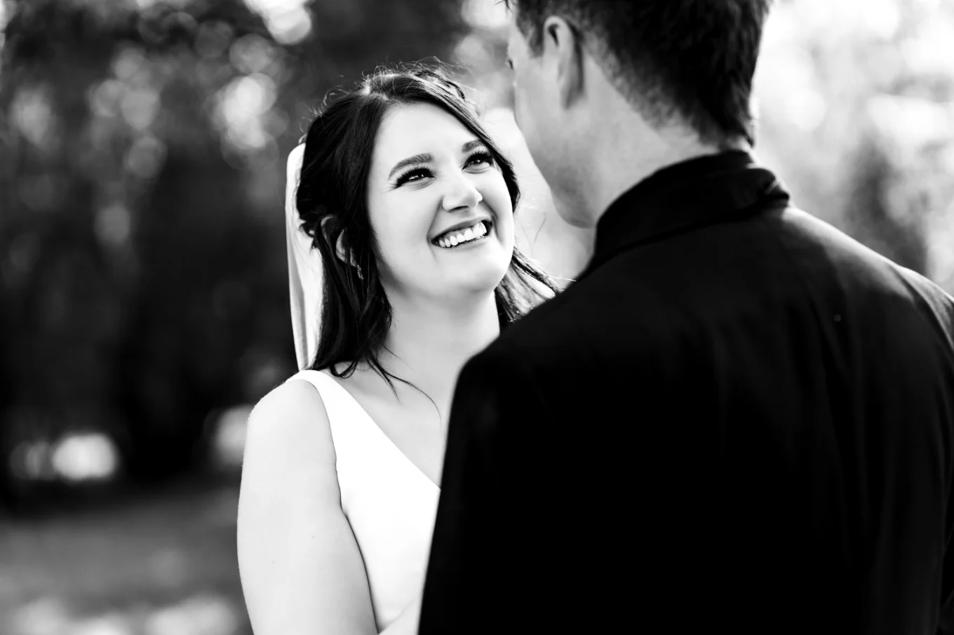 The bride look with love at the groom at the Calgary Wedding Ceremony