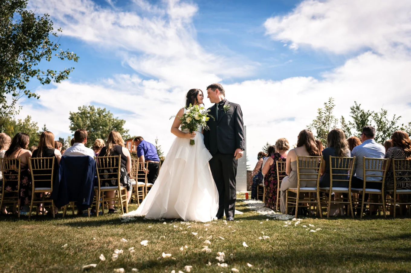 Farm Wedding Photography of the newlyweds walking down the aisle