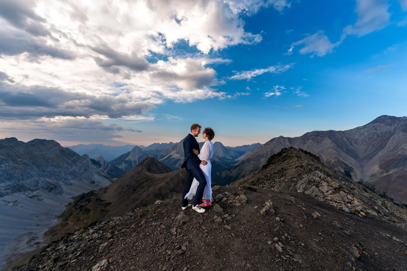 Banff Elopement Photography of the bride and groom in a hug in the mountans