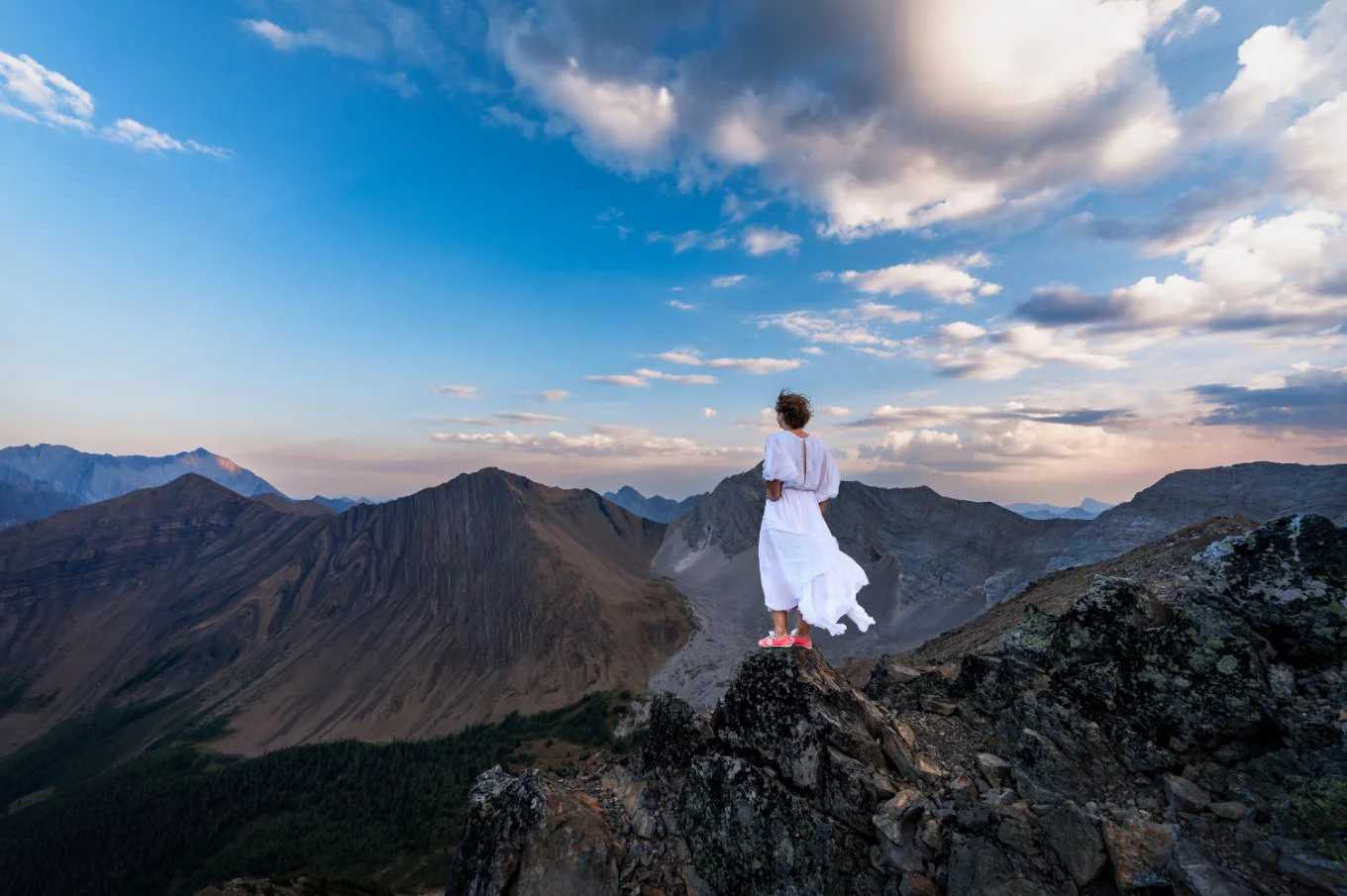 Banff wedding photography of the bride on the top of the mountain