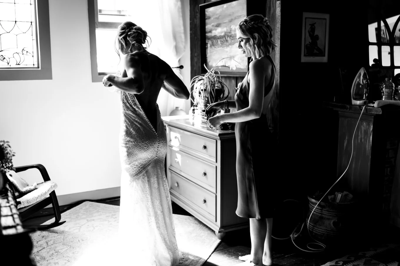 Bride put her dress on before the wedding in Waterton.