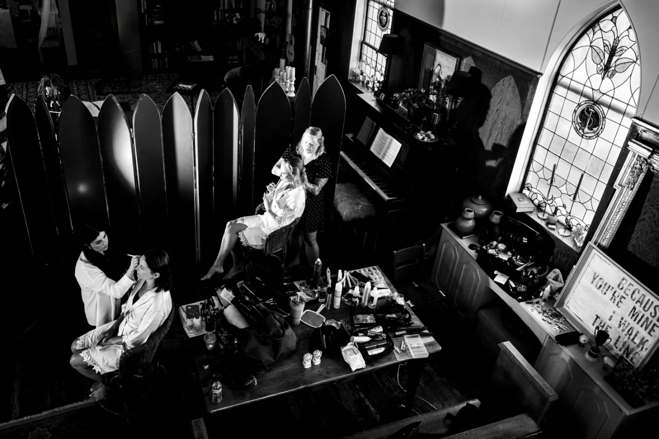Getting readi time in black and white before wedding ceremony in Waterton. Photo taken y banff Wedding photographers from the balcony.