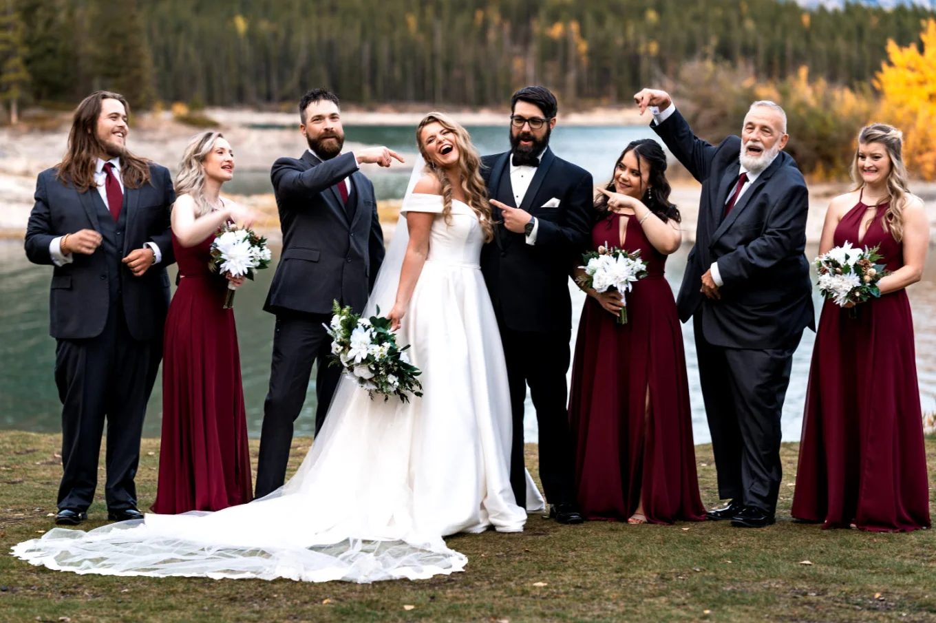 Wedding Party pointing their fingers at the bride during photo session with Bnaff Wedding Photographer