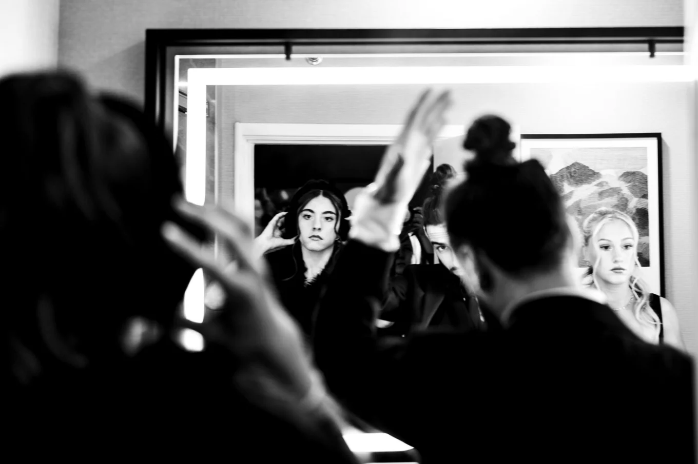 Getting ready time of the wedding party in front of the mirror before Banff Wedding Ceremony.