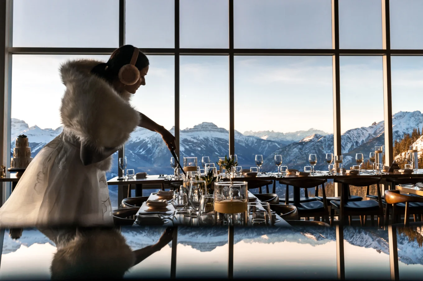 Bride lighten the candle at the wedding reception in Banff