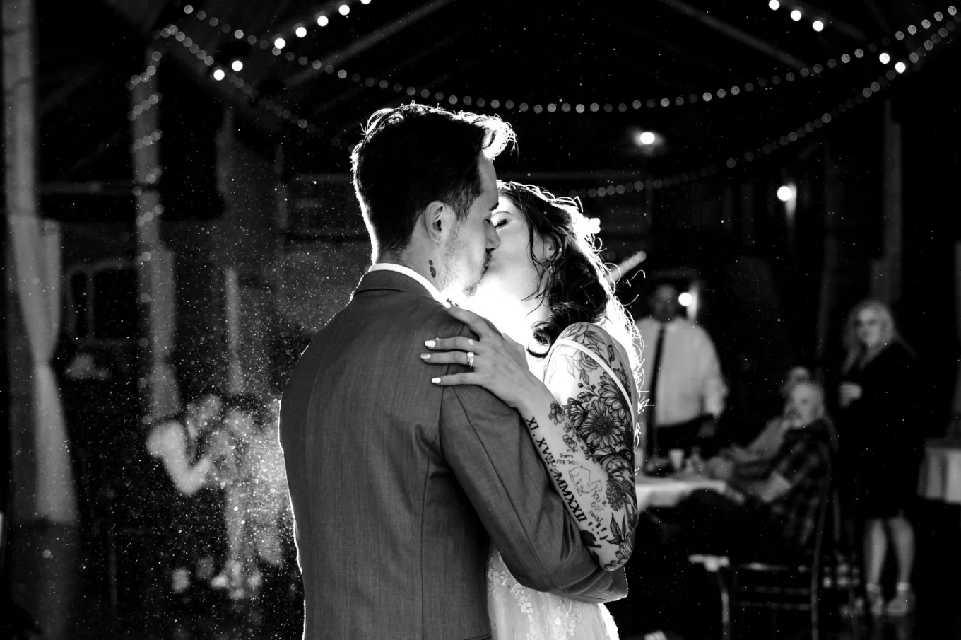 Bride and groom share a kiss during their first dance at the Calgary Wedding Day.