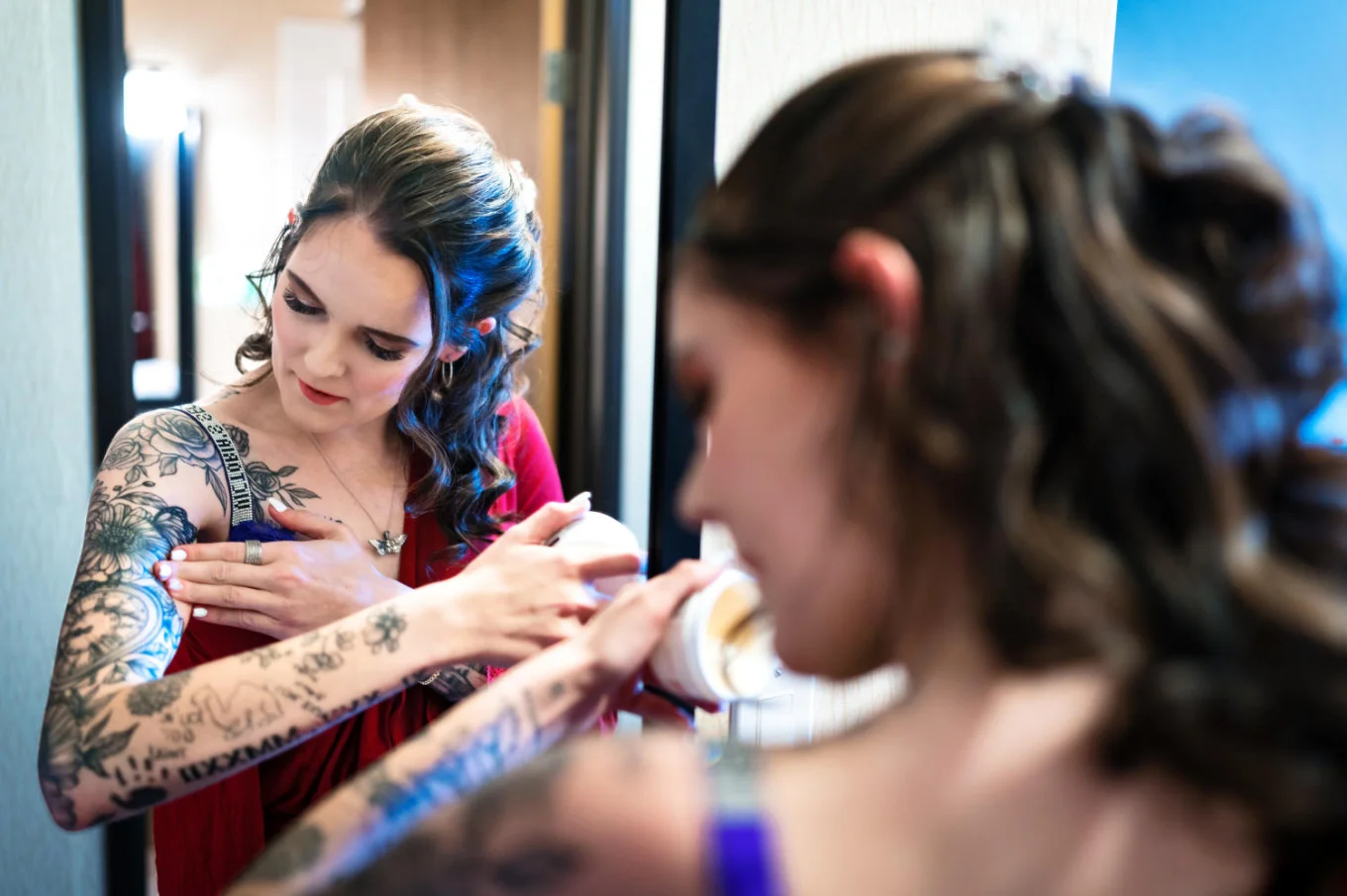 the future bride puts a cream on her tatoo
