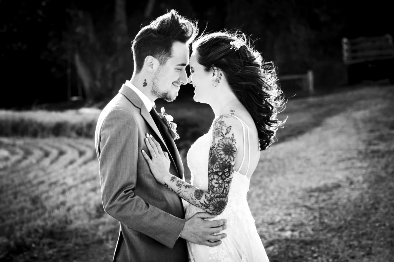 black and white Wedding Photograph of the newlyweds facing eachother.
