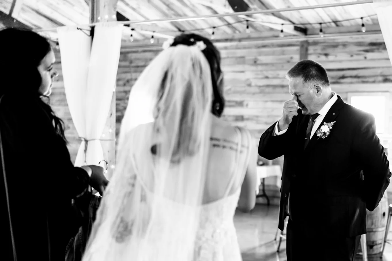 daughter - father first look before the Calgary wedding ceremony. Father cries.