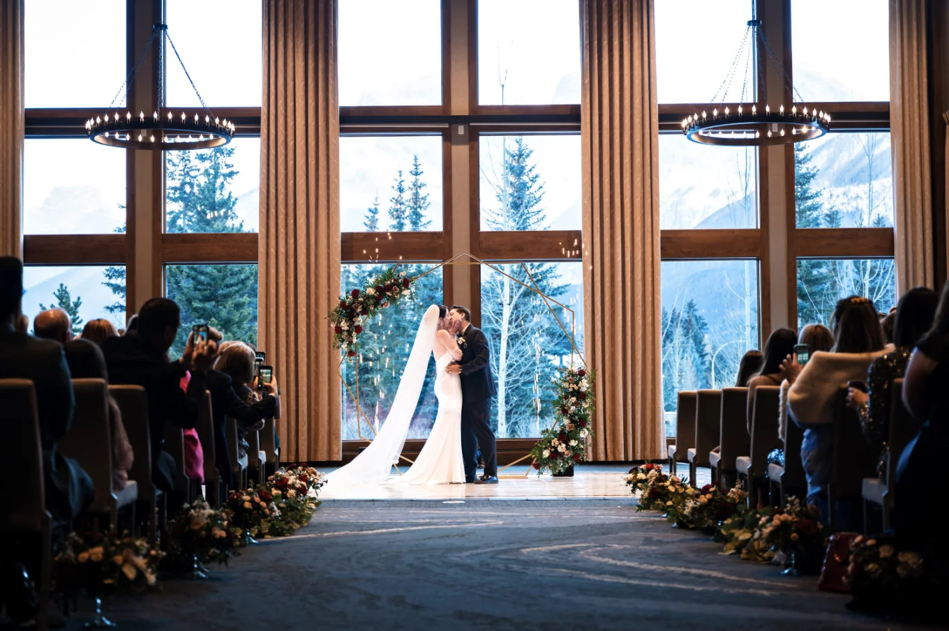 Canadian Wedding Photography of the first kiss in Canmore