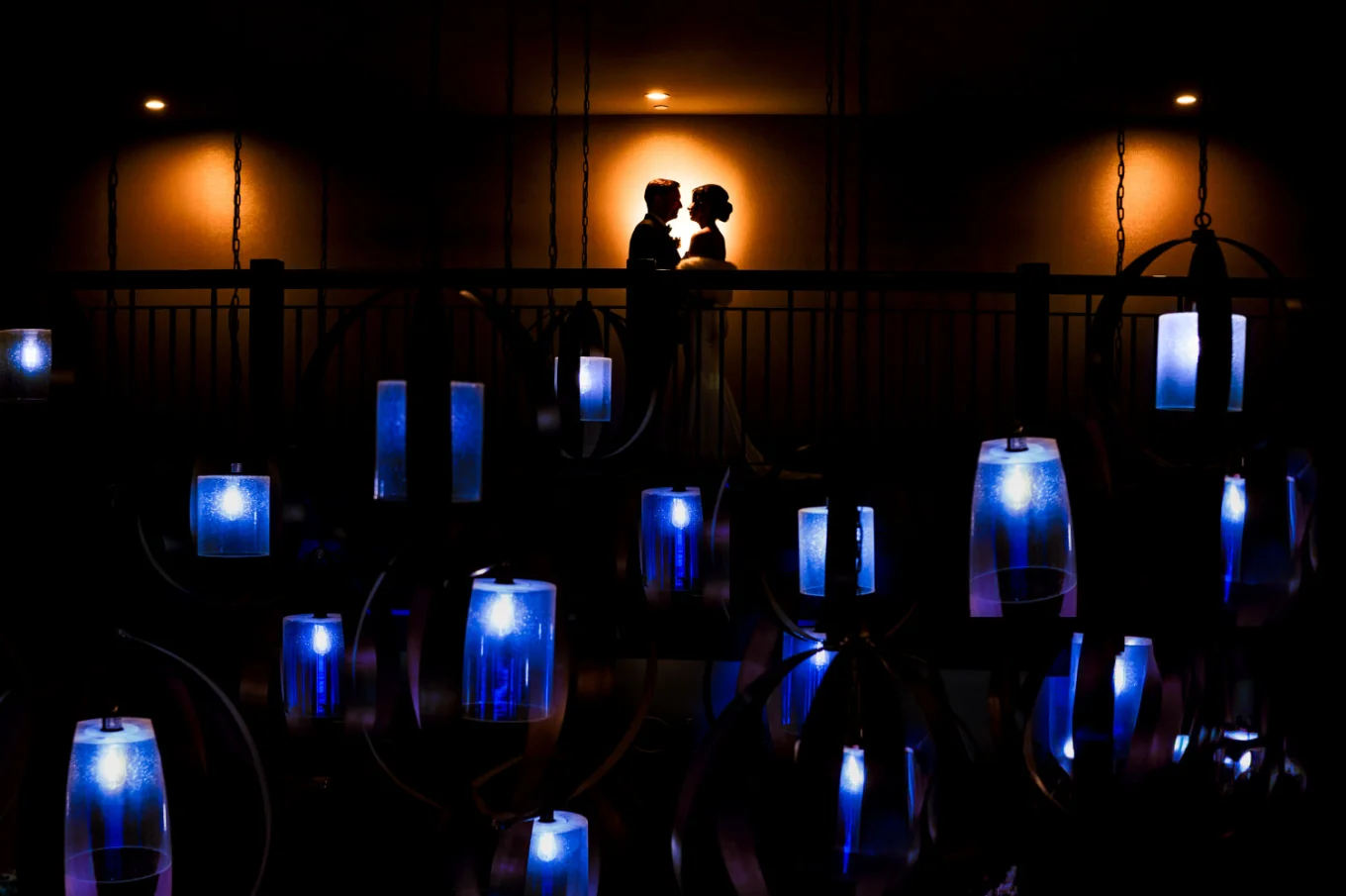 silhouetted couple in love against the wall.