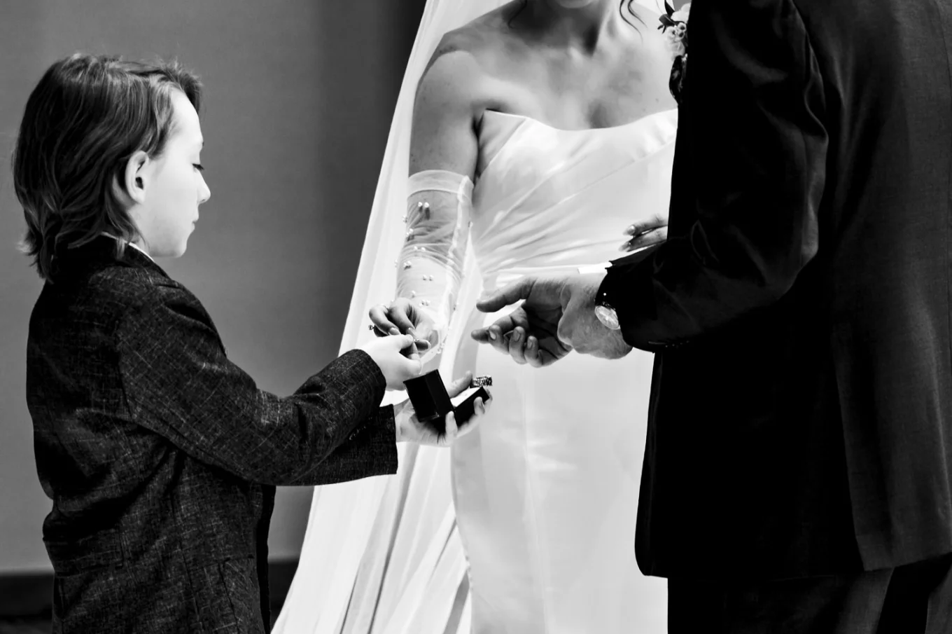 ring barrier passes the wedding rings on the Canmore Wedding Ceremony.