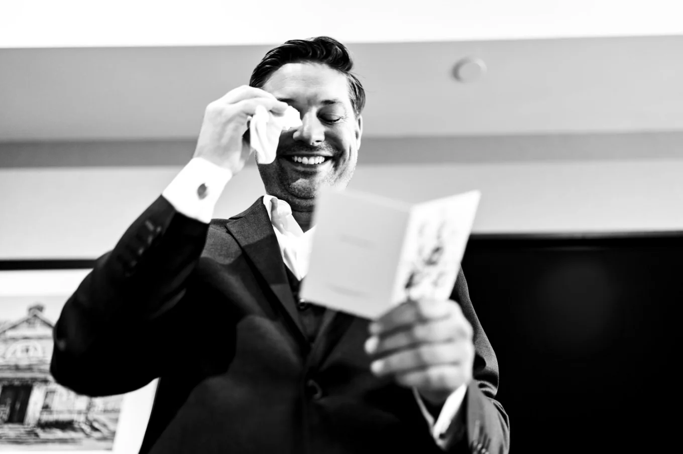 Groom wipes his eyes from tears before Canmore Wedding Ceremony