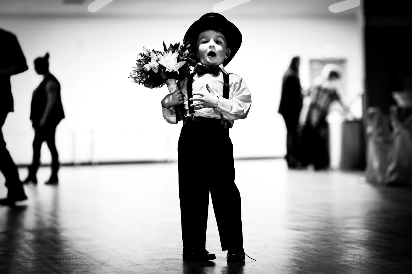 Ring Bearer carry the brides bouquet.