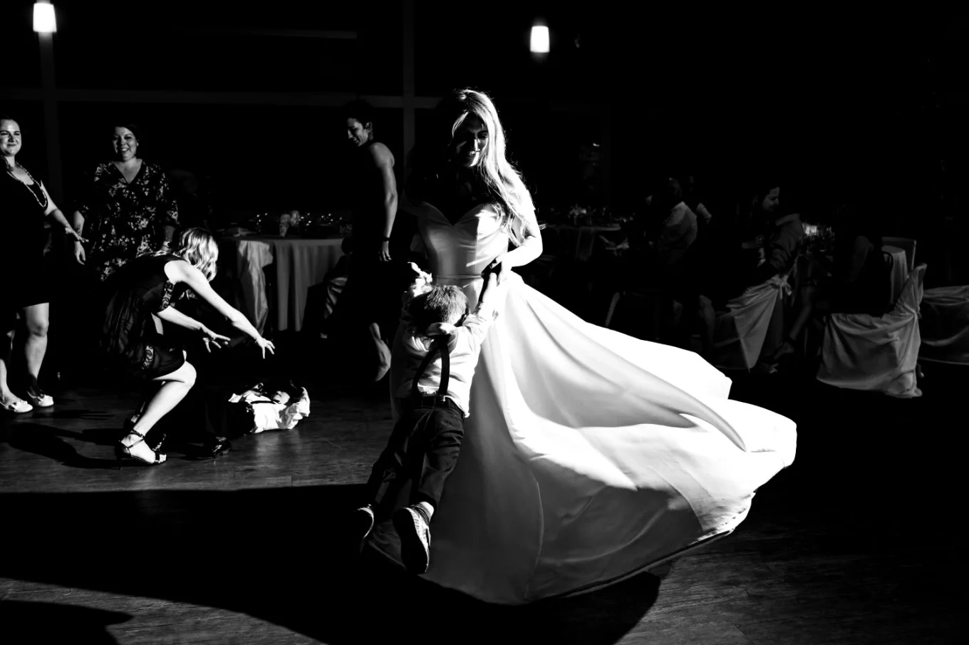 Bride dance with her little son at the wedding reception in Edmonton.