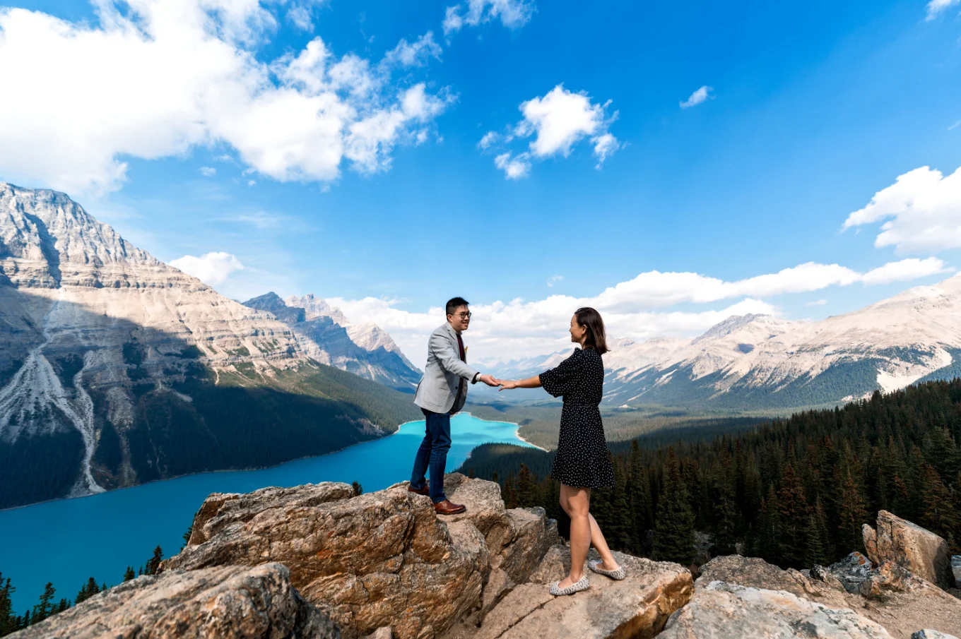 Couple in Love hikes at Peyto Lake in the Canadian Rockies