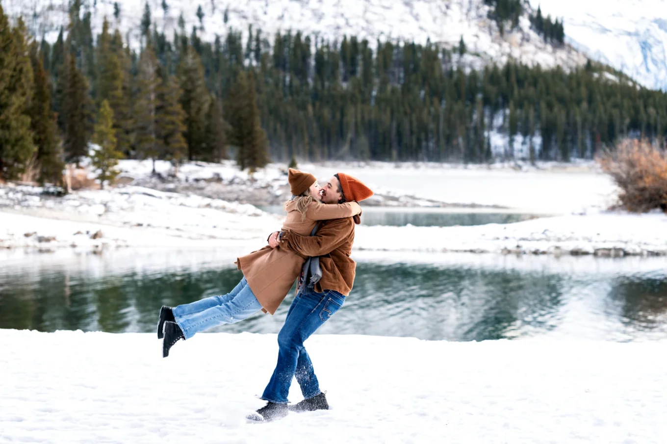 Engaged Couple Portrait Dancing in the snow